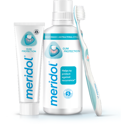 Sada produktů Meridol pro ochranu vašich dásní: zubní pasta, ústní voda a zubní kartáček.